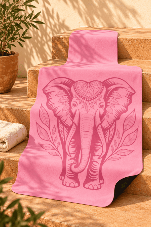 Lucky Elephant art Pilates mat hanging from the sunlit terracotta stairs